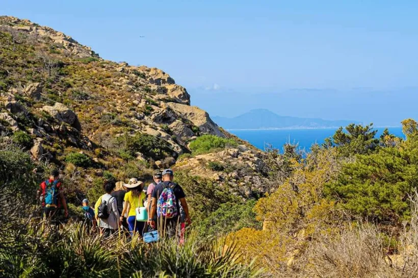 A group of eco-travelers exploring one of Tunisia’s scenic trails.