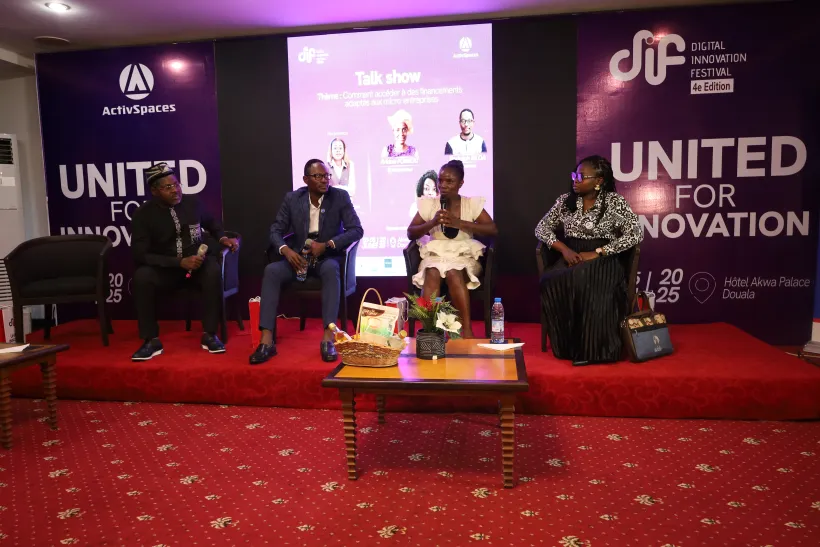 Panel of four speakers at the Digital Innovation Festival in Doulala, including WIDU's technical expert